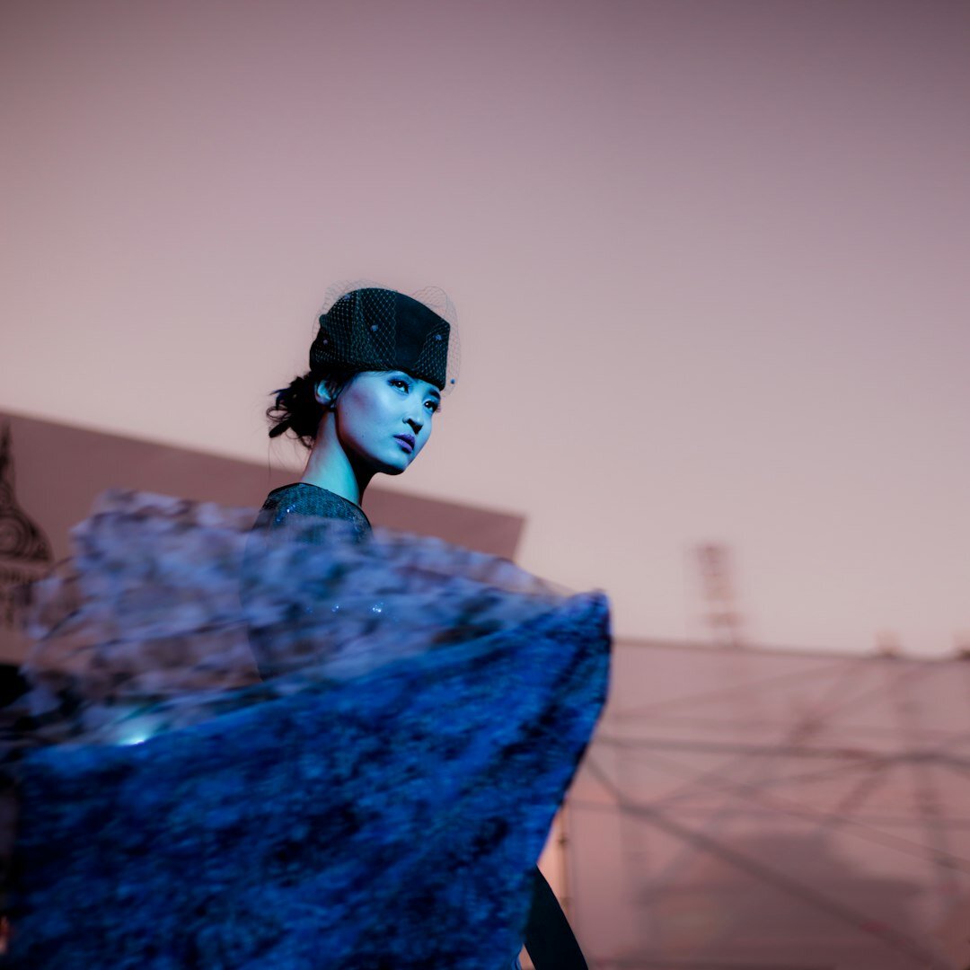 Model walking on a fashion show runway